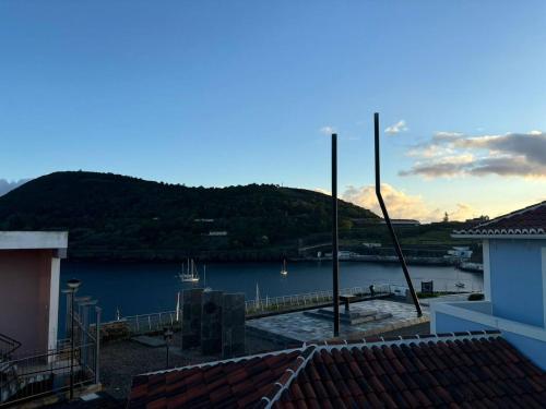 a view of a body of water with a mountain at Atlantis Azor II in Angra do Heroísmo