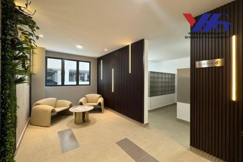 Χώρος καθιστικού στο Arena Designer Deluxe Suite KLIA