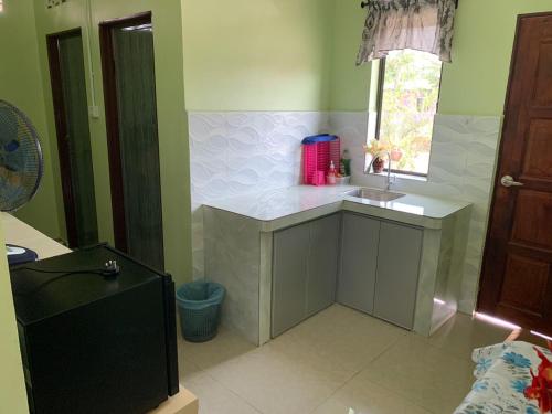 Kuchyň nebo kuchyňský kout v ubytování Teratak Annur Homestay