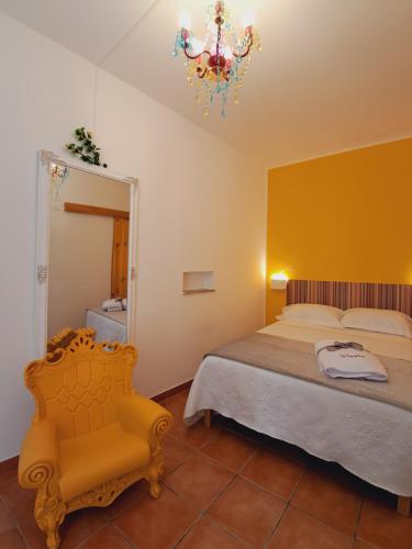 Postel nebo postele na pokoji v ubytování Suite Torre Del Porto