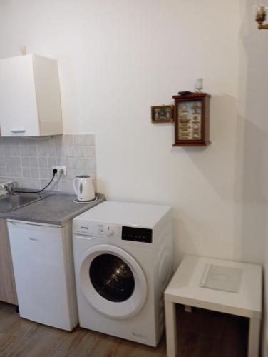Kuchyň nebo kuchyňský kout v ubytování Adriatica Apartments