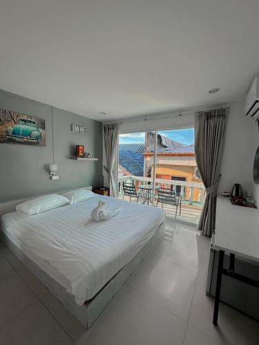 Ένα ή περισσότερα κρεβάτια σε δωμάτιο στο The Villa Residences Resort
