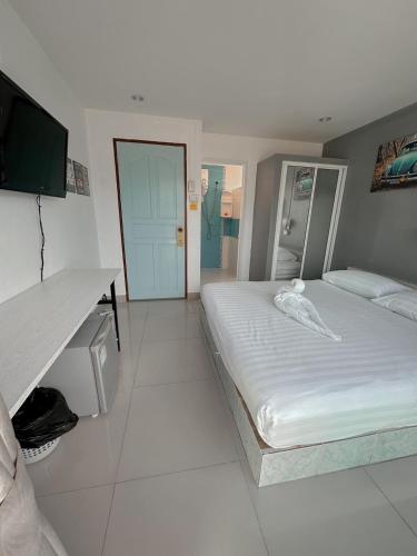 Ένα ή περισσότερα κρεβάτια σε δωμάτιο στο The Villa Residences Resort