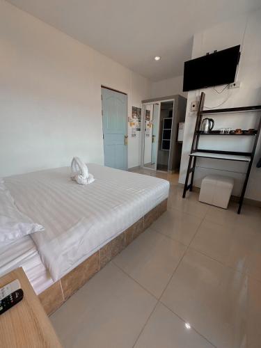 Ένα ή περισσότερα κρεβάτια σε δωμάτιο στο The Villa Residences Resort