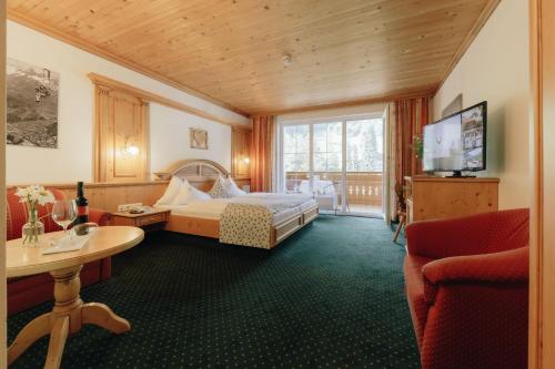 Postel nebo postele na pokoji v ubytování Hotel Hirschen