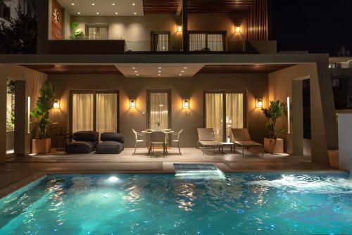 Bazén v ubytování Coocono Tinos Private Boutique Villas nebo v jeho okolí