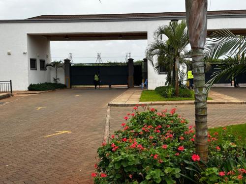 Κήπος έξω από το Tatu City Tranquility 3BR APT
