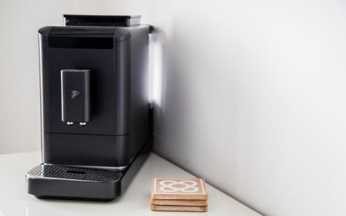 a black printer sitting on top of a table at La Brisa Atlántica in Morro del Jable