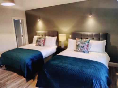 Postel nebo postele na pokoji v ubytování Luxury Guest house Claremorris