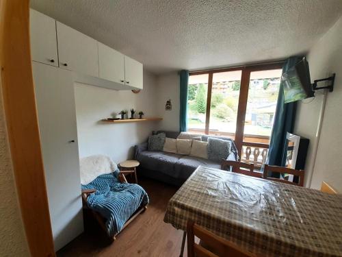 Coin salon dans l'établissement Résidence Thabor C - Studio pour 3 Personnes MAE-4671