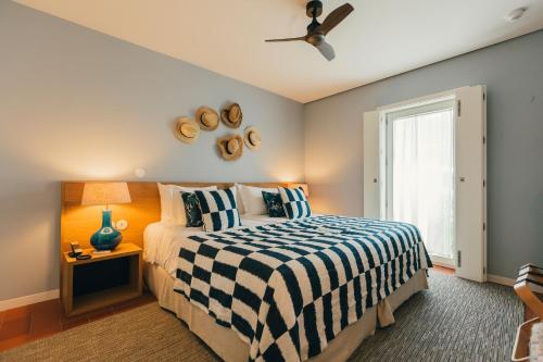 Un ou plusieurs lits dans un hébergement de l'établissement Ventozelo Hotel & Quinta