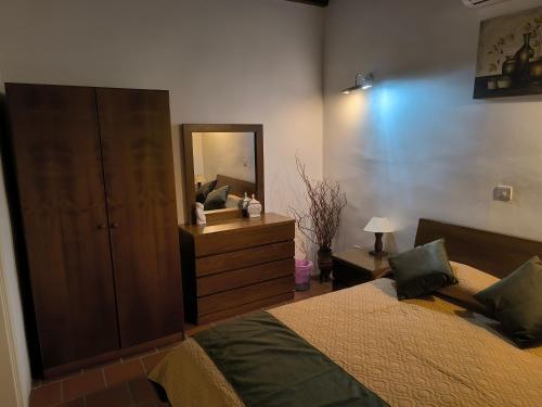 Postel nebo postele na pokoji v ubytování Enipnion Apartments
