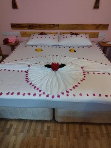 Кровать или кровати в номере MAMELLO Beach Club Maldives