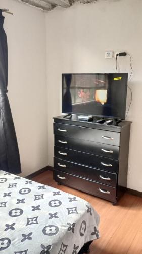 Katil atau katil-katil dalam bilik di Apartamento Portal americas