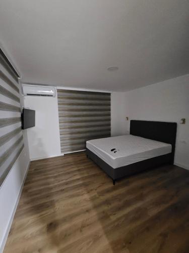 Postel nebo postele na pokoji v ubytování Apartment Anita Cetinje