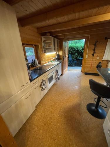 a kitchen with a sink and a counter top at Ferienhäuser an den Orgelpfeifen Scheibenberg in Scheibenberg