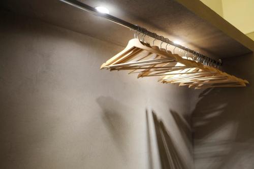 a towel rack hanging from a wall in a bathroom at Strozzi Luxury Apartment in Florence