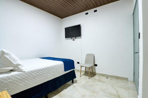 Letto o letti in una camera di APARTAMENTO LA CAPITAL