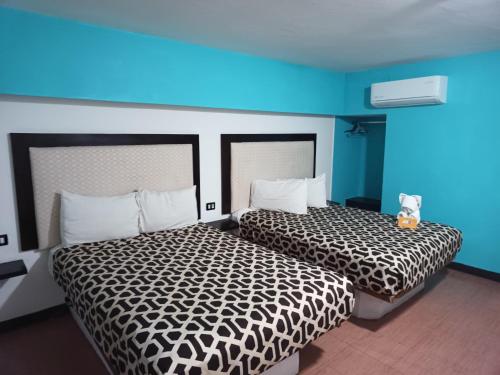 Кровать или кровати в номере Hotel Essen's