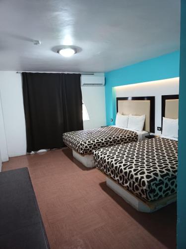 Кровать или кровати в номере Hotel Essen's
