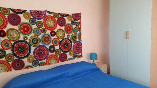 Postel nebo postele na pokoji v ubytování La Casa sopra il Mare