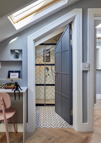 a door leading into a room with a wine cellar at Pineapple House Boutique Hotel in Cape Town