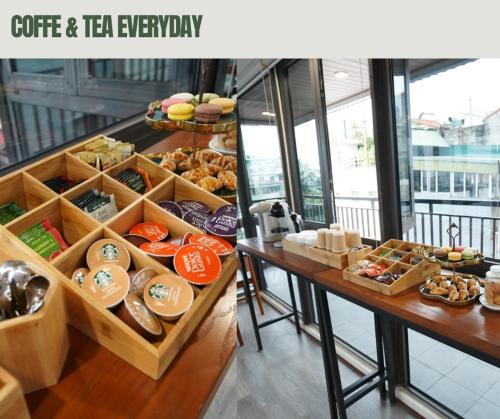 a bakery with many different types of pastries on display at An Nguyen Boutique Hotel in Hanoi