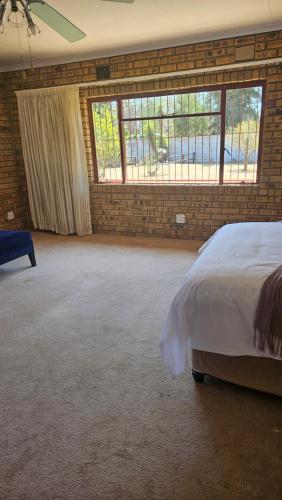 Kwa Mimi Guesthouseにあるベッド