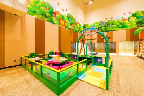 a childs play room with a roller coaster at Nara Plaza Hotel in Tenri