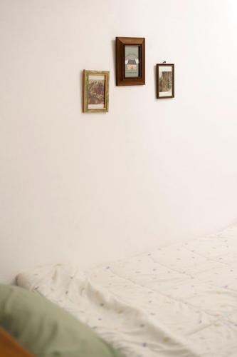 Ein Bett oder Betten in einem Zimmer der Unterkunft Ta Kaew Hostel ตาแก้ว โฮสเทล