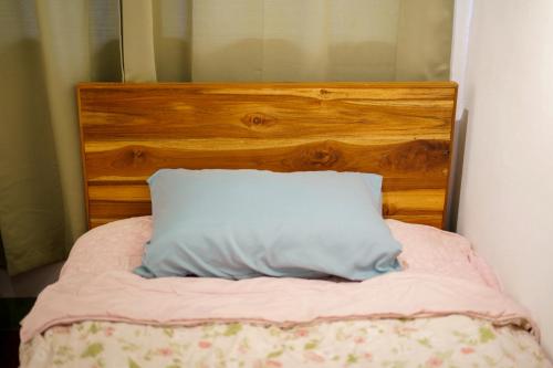 Ein Bett oder Betten in einem Zimmer der Unterkunft Ta Kaew Hostel ตาแก้ว โฮสเทล