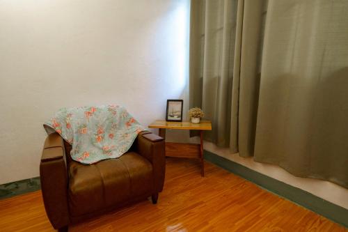 Ein Sitzbereich in der Unterkunft Ta Kaew Hostel ตาแก้ว โฮสเทล
