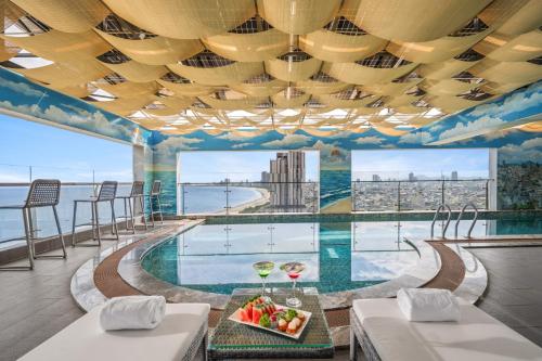 a pool on the top of a building at Nguyen Gia Hotel in Danang