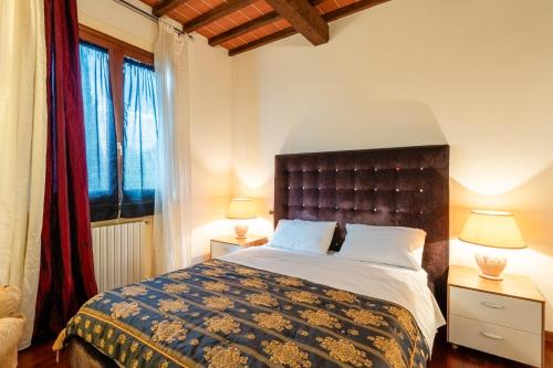 Postel nebo postele na pokoji v ubytování Villa Serafina