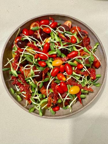 a plate of vegetables on top of a table at Nof Beresheet in Midreshet Ben Gurion
