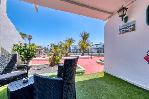 Apartment La Vela Azul - Pool & Tennis - Free AC & Good WIFI - By Lanzarote Vacation Homes