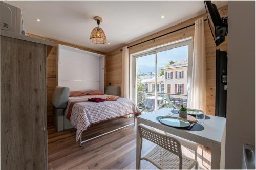 Postel nebo postele na pokoji v ubytování L' edelweiss