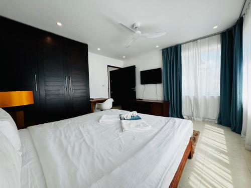 Ένα ή περισσότερα κρεβάτια σε δωμάτιο στο Seaview Prima Villa Karon beach