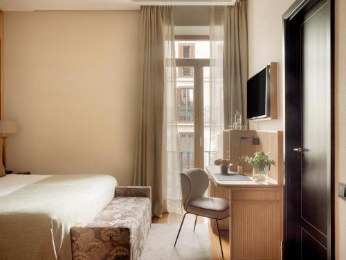 Μια τηλεόραση ή/και κέντρο ψυχαγωγίας στο Hotel Único Madrid, Small Luxury Hotels