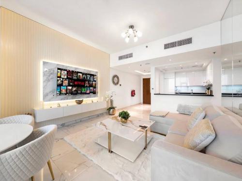 a living room with a couch and a table at Luxury Apt in Business Bay Water canal view in Dubai