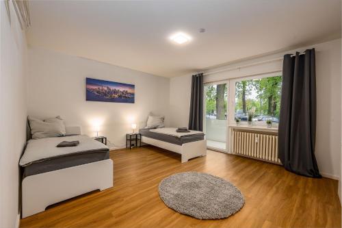 Postel nebo postele na pokoji v ubytování Business Apartments mit 1-2 Schlafzimmern in Lippstadt
