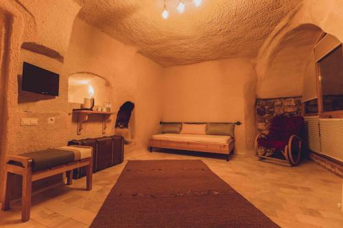 Pinhan Cave Suitesにあるテレビまたはエンターテインメントセンター