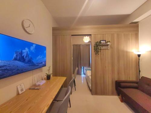 1BR Condotel with Balcony at FAME Residences #FM37
