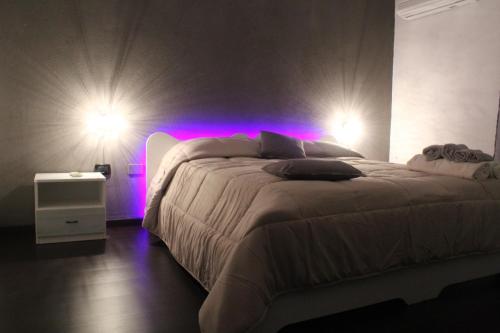 Ένα ή περισσότερα κρεβάτια σε δωμάτιο στο B&B Meddie