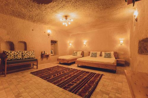 Pinhan Cave Suitesにあるベッド