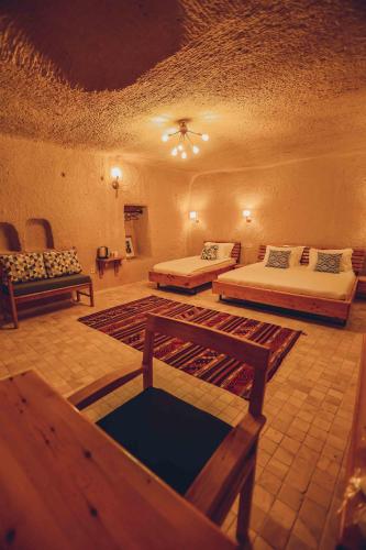 Pinhan Cave Suitesにあるベッド