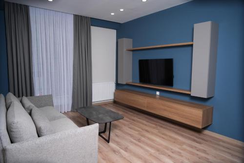 TV a/nebo společenská místnost v ubytování Eikon Apartments Abastumani
