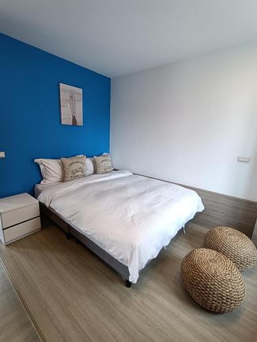 Una cama o camas en una habitación de 迦那會館