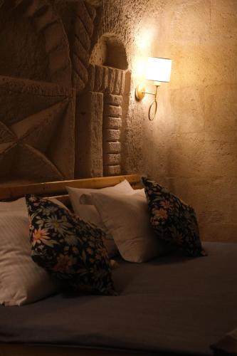 Pinhan Cave Suitesにあるベッド