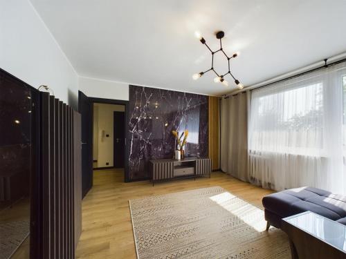 Χώρος καθιστικού στο ApartamentySnu, Przystań Nad Potokiem II
